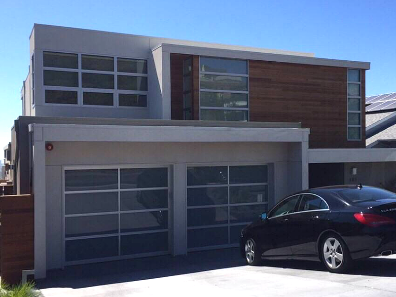 Local garage door repair in Sarasota, FL with a professional technician providing high-quality repair services.