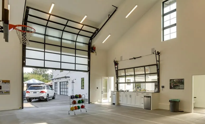 A professional technician is performing overhead garage door repair in Sarasota, FL, using precision tools and equipment.